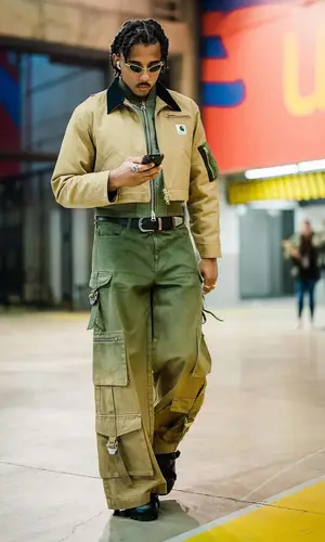 Jules Kounde’s Outfit in Sacai Jacket, Louis Vuitton Eyewear & Carhartt (2024)