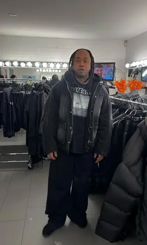Ty Dolla Sign wearing Kanye West Merch t-shirt