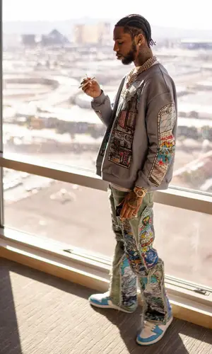 Key Glock wearing Who Decides War sweatshirt