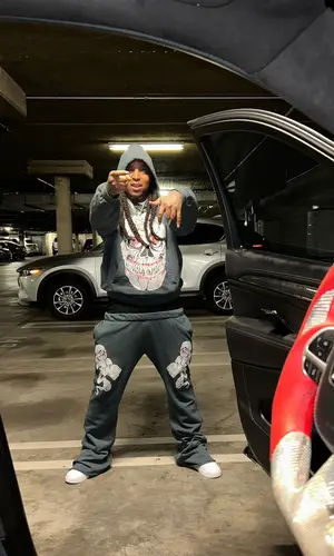 Tadoe wearing Cosey X Cosey hoody