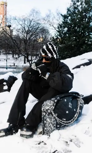 Kai Cenat wearing Balenciaga boots