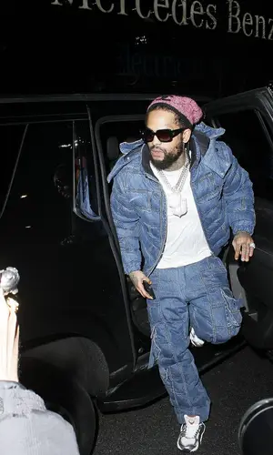 Dave East’s Outfit in Romeo Hunte Jacket, Asics Sneakers & Chanel Hat (2024)