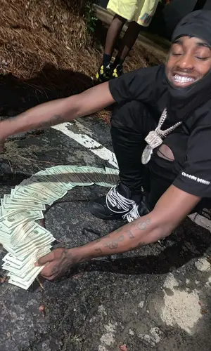 Mac Critter wearing Amiri jeans