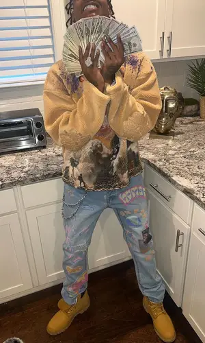 Mac Critter wearing Timberland boots