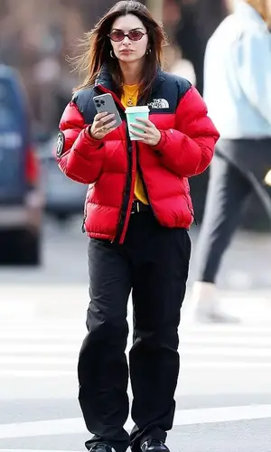 Emily Ratajkowski’s Outfit in The North Face Jacket, Puma Sneakers & Miu Miu Eyewear (2024)
