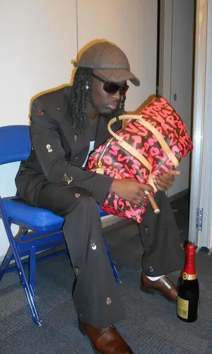 Kai Cenat wearing Louis Vuitton boots