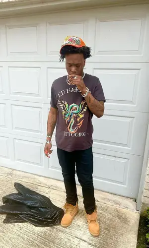 2KBABY’s Outfit in Amiri Jeans, Timberland Boots & Ed Hardy Cap (2024)