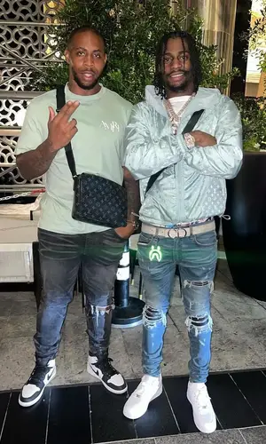 Russ Millions’ Outfit in Louis Vuitton Jacket, Amiri Jeans & Dior Belt (2024)