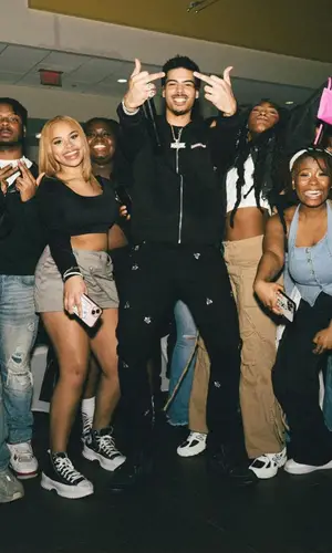 Jay Critch’s Outfit in Chrome Hearts Hoodie, Dior Jeans &   Kaws (2024)