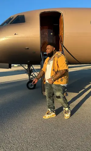 Rod Wave’s Outfit in Honor The Gift Shirt, Hanes Top & Lanvin Sneakers (2024)