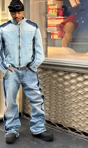 Josh Levi wearing Diesel jacket
