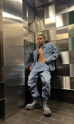 Josh Levi wearing Diesel jacket