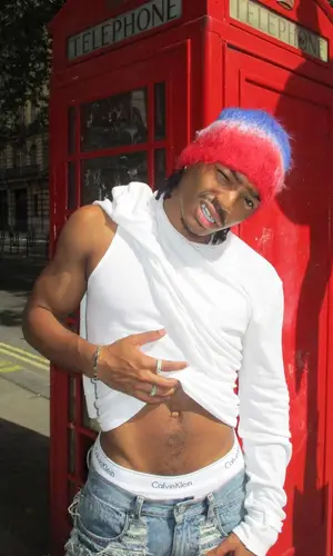 Josh Levi wearing ERL hat