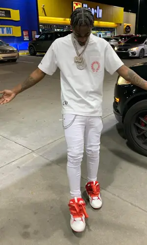 Mac Critter wearing Amiri jeans