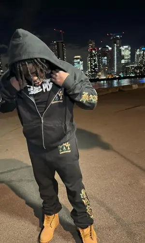 Baby Drill wearing Chrome Hearts hoody