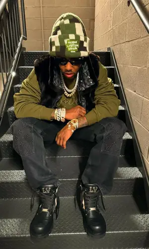 Fabolous wearing Louis Vuitton boots