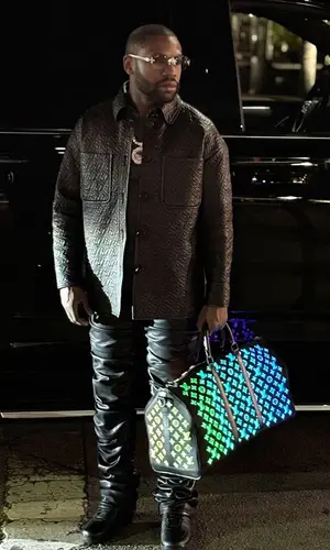 Floyd Mayweather’s Outfit in Fendi Jacket, Nike Sneakers & Louis Vuitton Bag (2024)