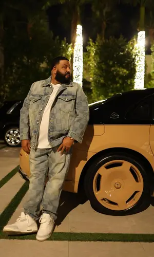 DJ Khaled wearing Louis Vuitton jeans