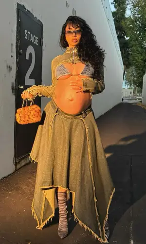 Kali Uchis wearing Louis Vuitton bag