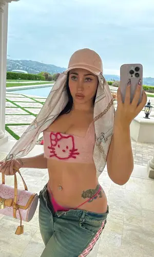 Kali Uchis wearing I.Am.Gia jeans
