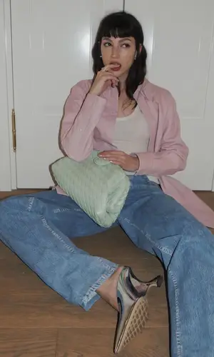 Ursula Corbero wearing Bottega Veneta jeans