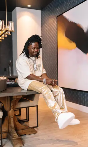 Jackboy wearing Ami trousers