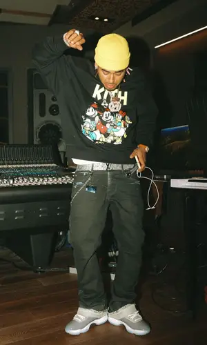 Ozuna’s Outfit in Kith Sweatshirt, Louis Vuitton Belt & Disney (2024)