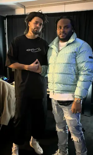 Tee Grizzley’s Outfit in Dior Jacket, Amiri Jeans & Saint Laurent Bag (2024)