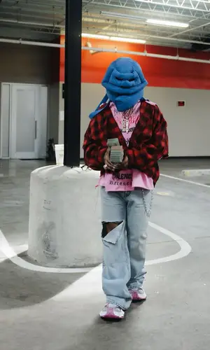 Rylo Rodriguez wearing Balenciaga shirt