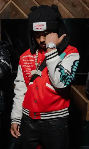 DThang Gz wearing Louis Vuitton bag