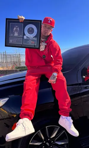 Millyz wearing New Era cap