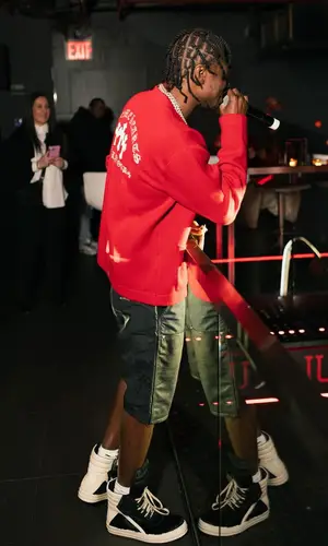Lil Tjay wearing Nike sock
