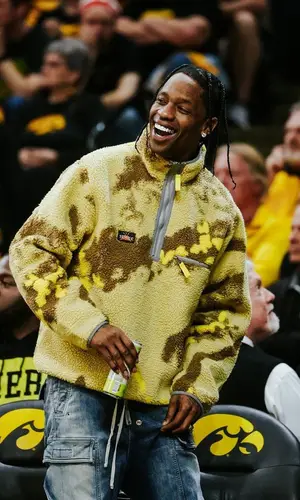 Travis Scott wearing Travis Scott Merch sweater