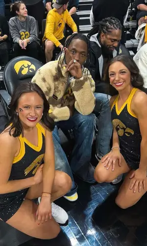 Travis Scott wearing Travis Scott Merch sweater