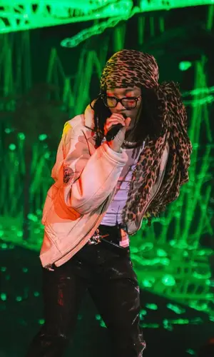 Lil Tecca wearing Chrome Hearts top