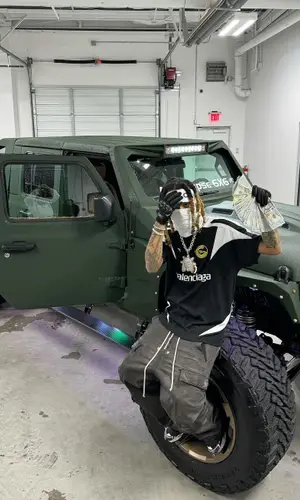 Lil Gnar wearing Givenchy hat