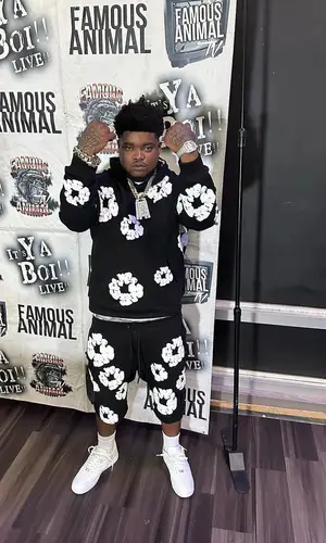 BossMan Dlow wearing Readymade shorts