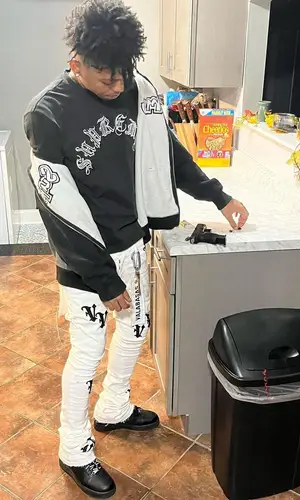 Hopout Shawn wearing Supreme sweatshirt