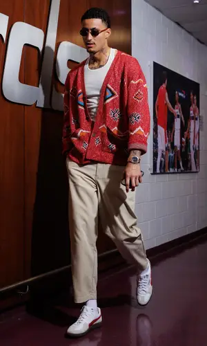 Kyle Kuzma’s Outfit in Lost Daze Sweater, Puma Sneakers & Cartier Eyewear (2024)