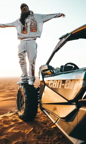 Millyz’s Outfit in Who Decides War Hoodie & Nike Sneakers (2024)