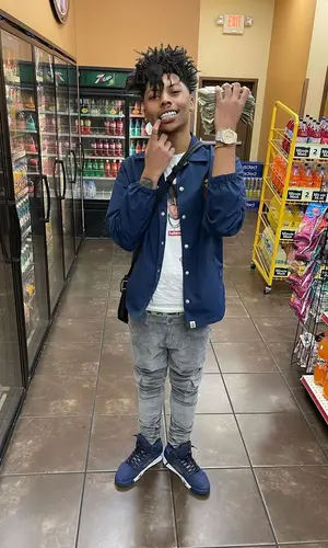 Hopout Shawn wearing Supreme bag
