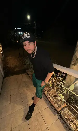 Jesus Ortiz Paz’s Outfit in Louis Vuitton Shorts, Amiri Cap & Nike Socks (2024)
