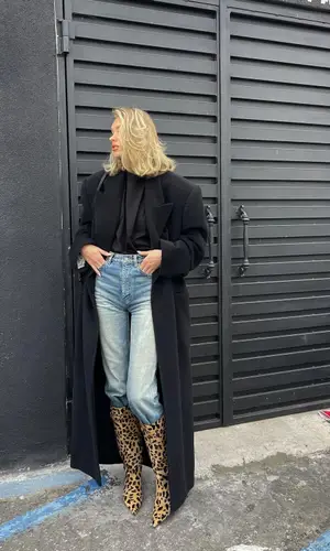 Elsa Hosk’s Outfit in Saint Laurent Jacket, Alaïa Boots & Loewe Bag (2024)