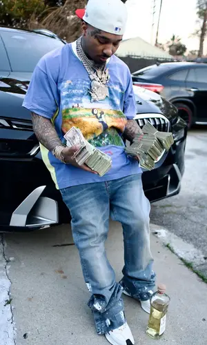 Doe Boy wearing Better With Age t-shirt