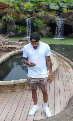 Mazi Vs’ Outfit in Hanes T-Shirt, Nike Sneakers & Burberry Swimwear (2024)
