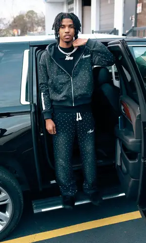 Lil Darius wearing Luv Abominable pants