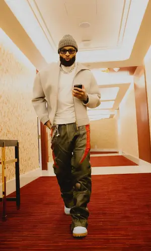 Odell Beckham Jr’s Outfit in Miu Miu Hoodie, Timberland Boots & Retrosuperfuture Eyewear (2024)