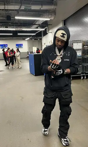 Baby Money’s Outfit in Balenciaga Hoodie, EPTM Pants & Chanel Hat (2024)
