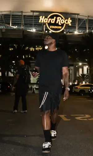 Pusha T’s Outfit in Uniqlo T-Shirt, Rick Owens Shorts & Wales Bonner Sneakers (2024)