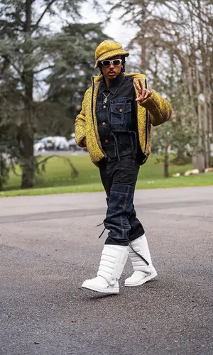 Jules Kounde’s Outfit in Louis Vuitton Jacket, Ugg Boots & Kenzo Eyewear (2024)